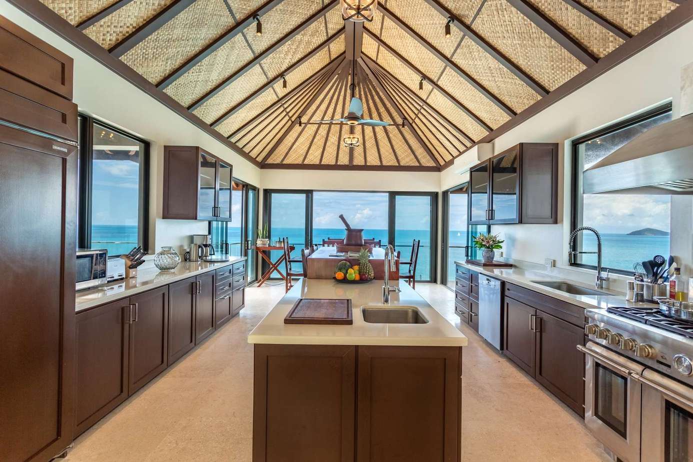 Spacious kitchen with ocean views and vaulted ceilings