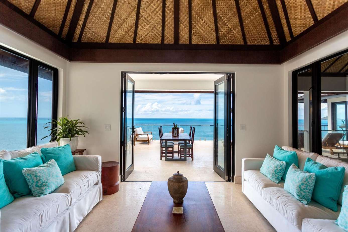 Oceanfront living room with seamless indoor-outdoor flow