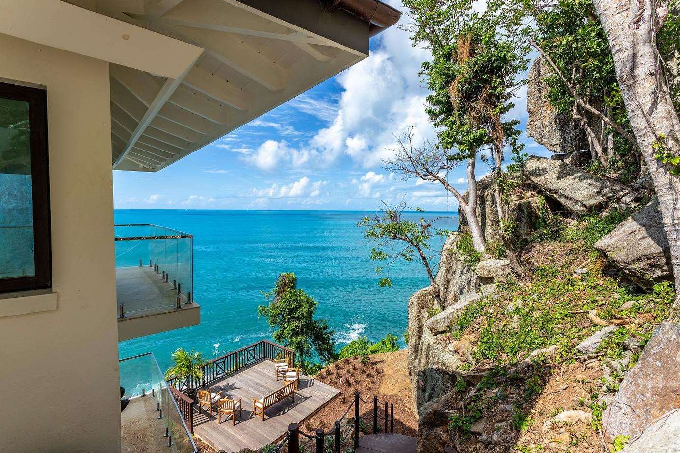 Oceanview patio retreat with hammock and tropical breeze