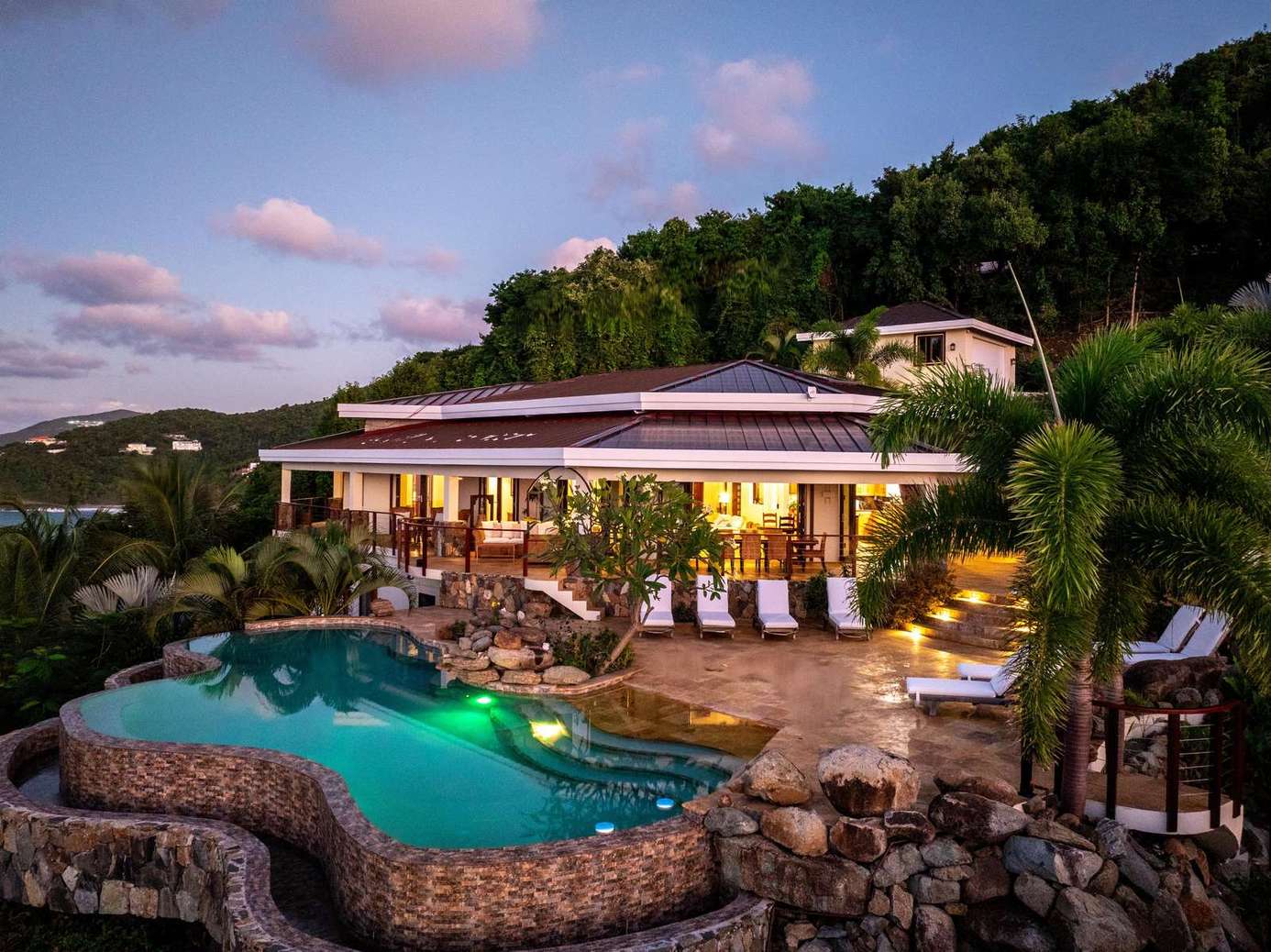 Sunset views and infinity pool in spacious outdoor lounge