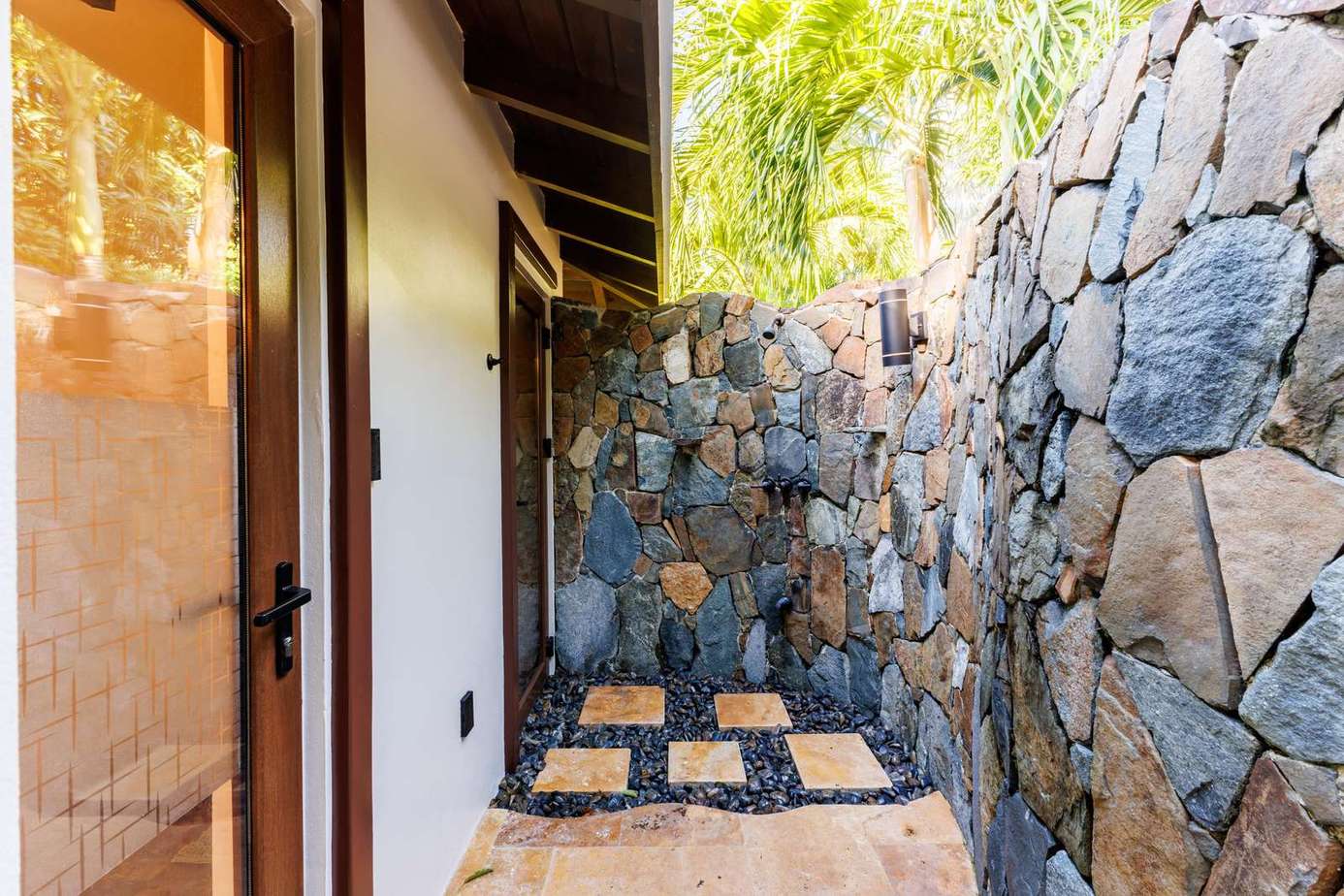 Secluded stone-walled patio perfect for peaceful mornings