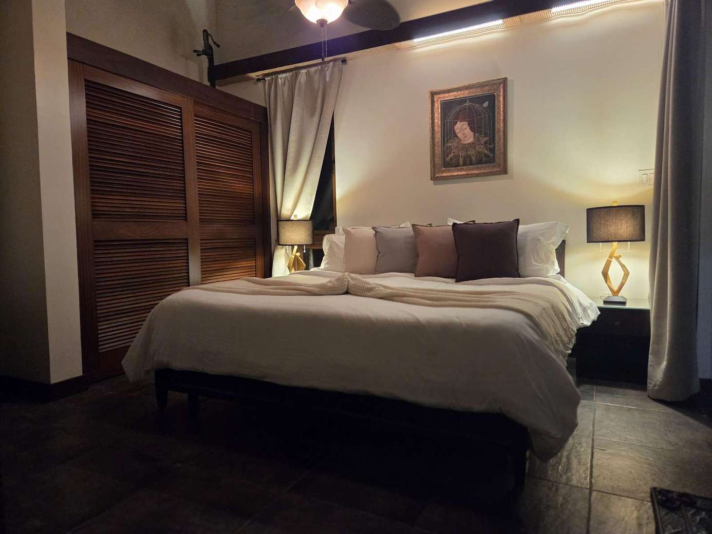 Cozy bedroom retreat with warm ambient lighting and elegant decor