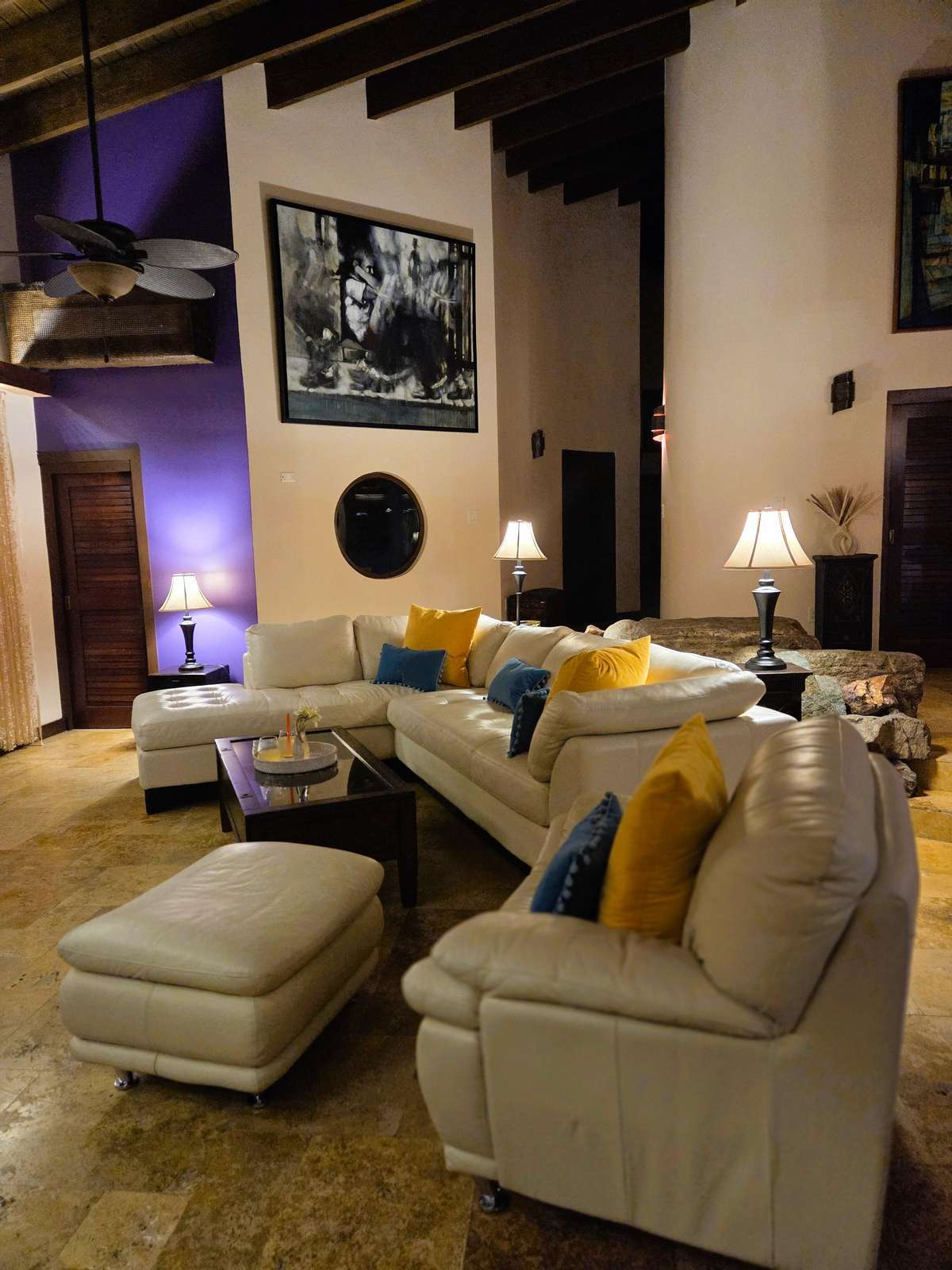 Cozy living room with warm lighting and plush seating