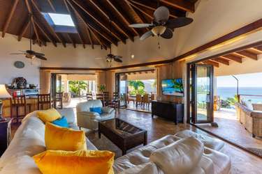 Spacious living room with panoramic ocean views and open-air comfort