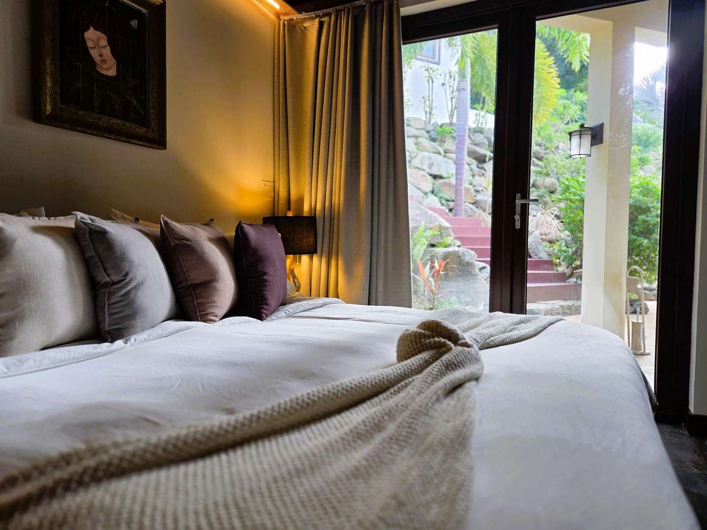 Cozy bedroom retreat with serene garden views