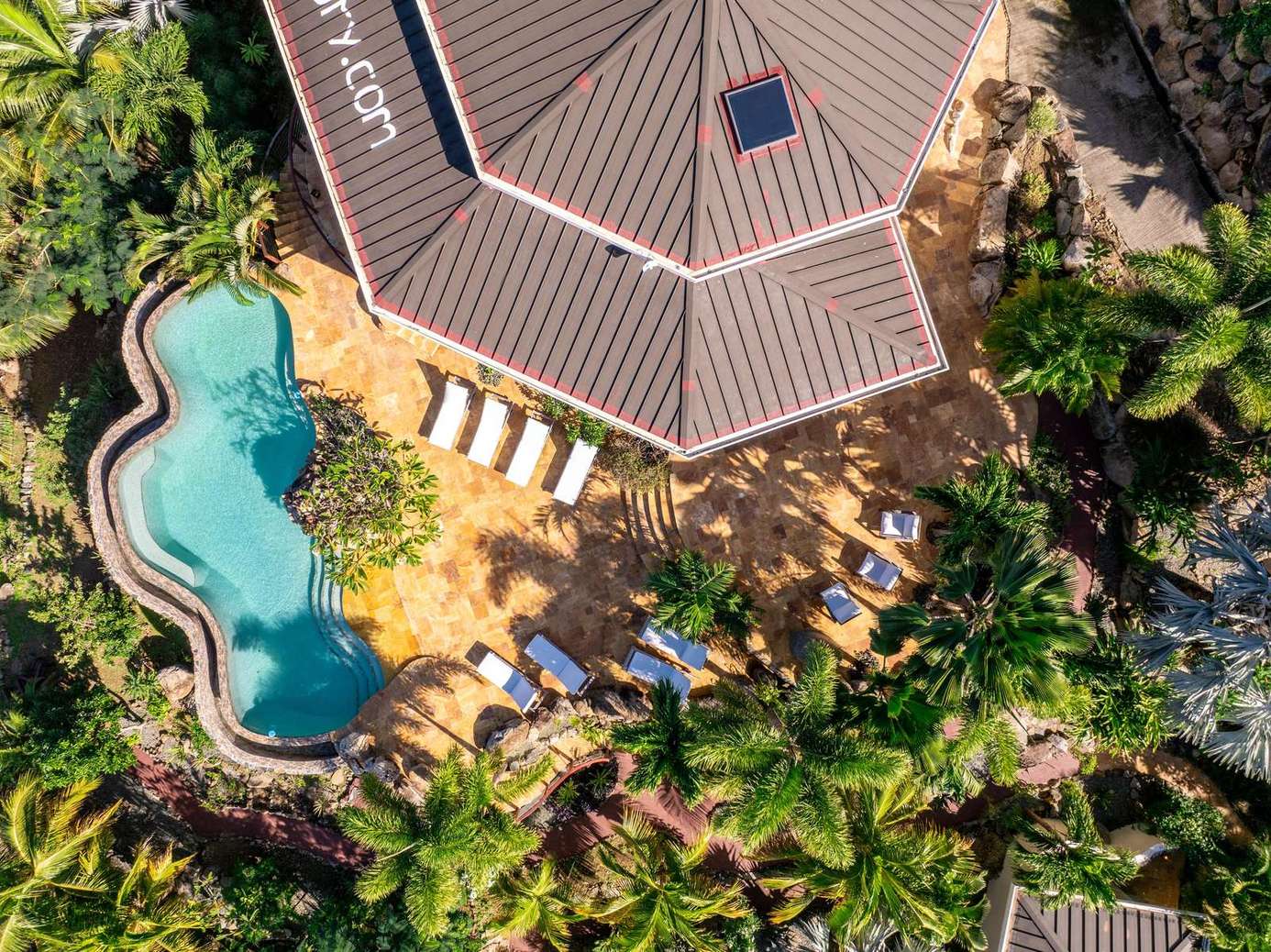 Secluded tropical oasis with private pool and lush gardens