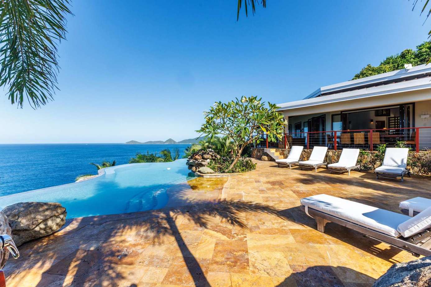Oceanfront patio with infinity pool and panoramic views
