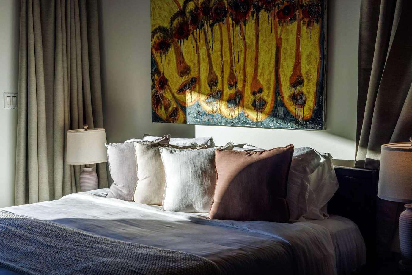 Cozy bedroom retreat with plush pillows and ambient lighting