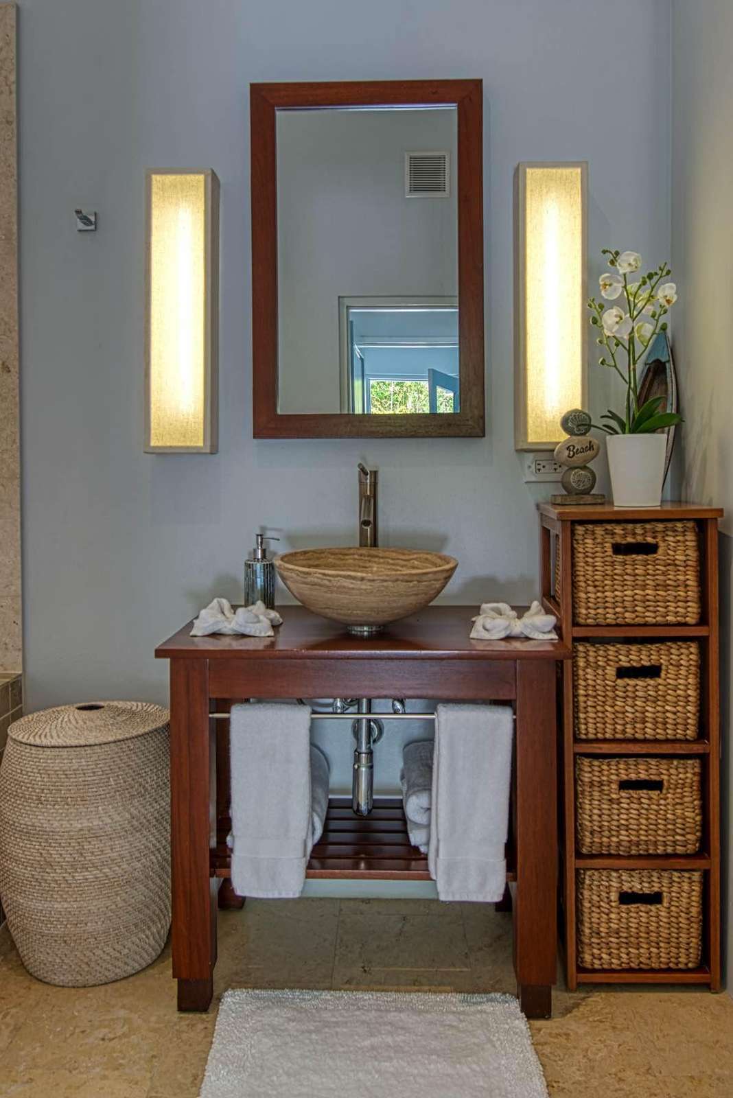 Cozy bathroom retreat with warm lighting and natural accents