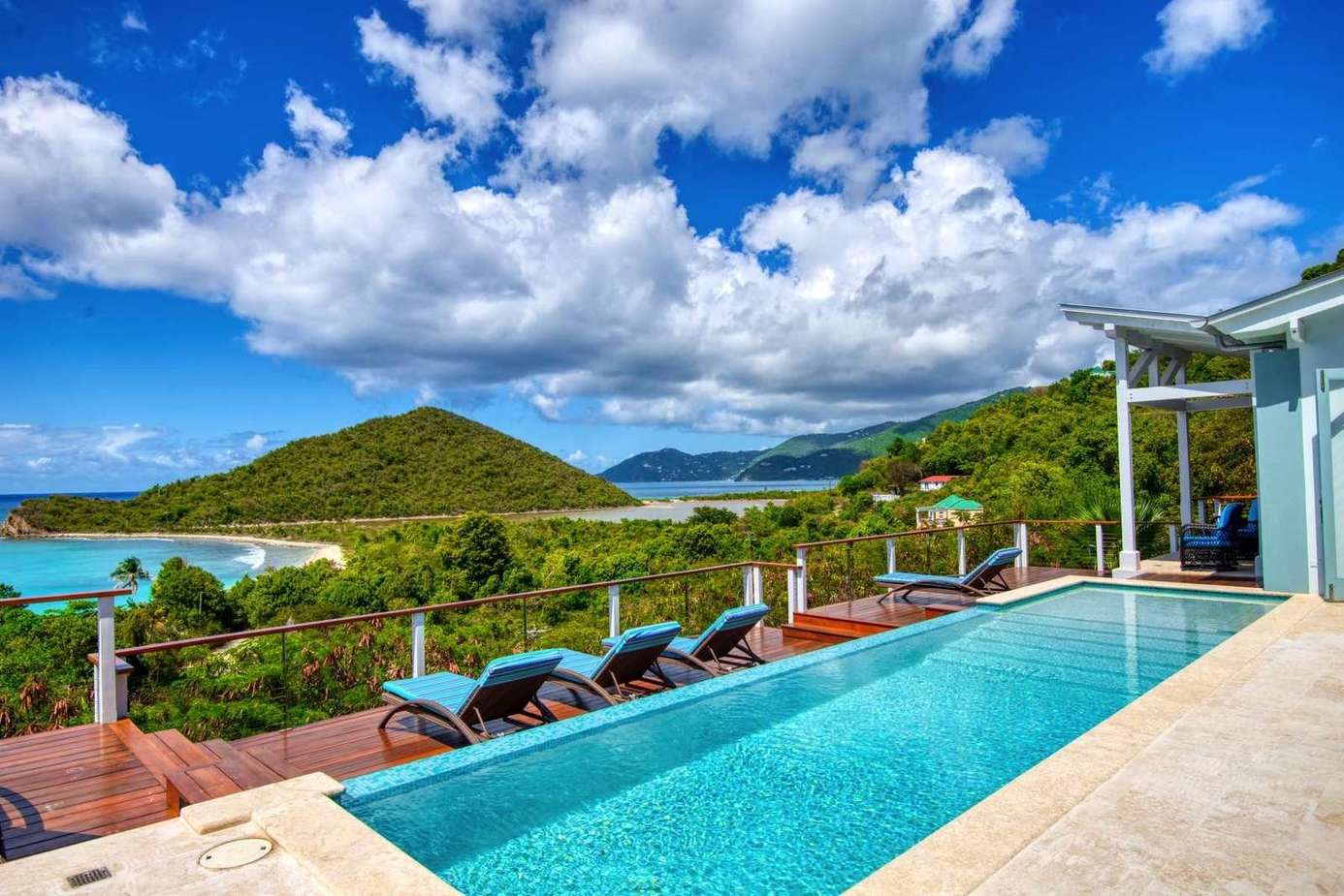 Infinity pool with panoramic ocean and island views