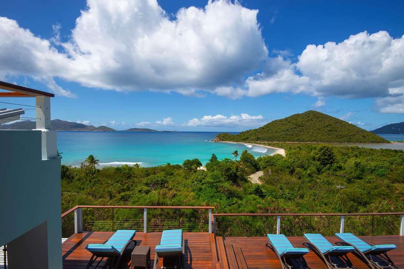 Oceanfront deck with panoramic island and beach views