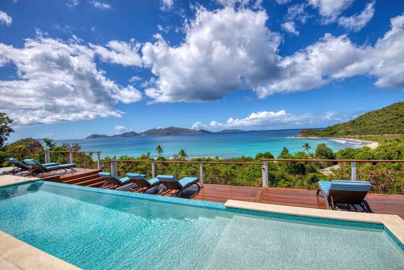 Infinity pool with stunning ocean and mountain views