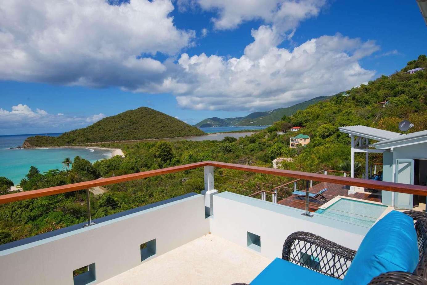 Spacious balcony with panoramic ocean and island views