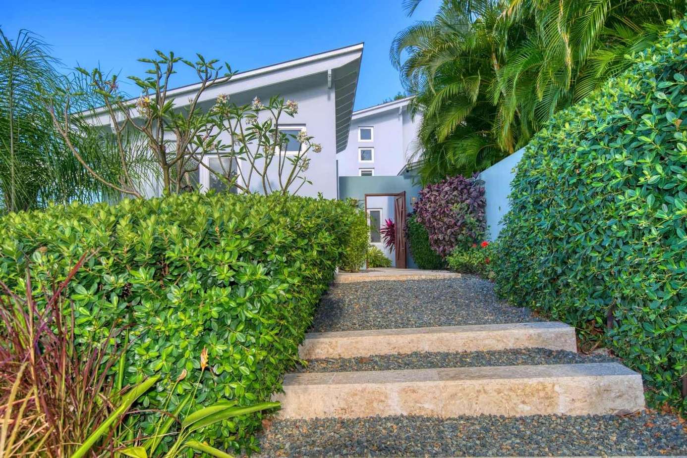 Welcoming garden pathway leading to your serene retreat