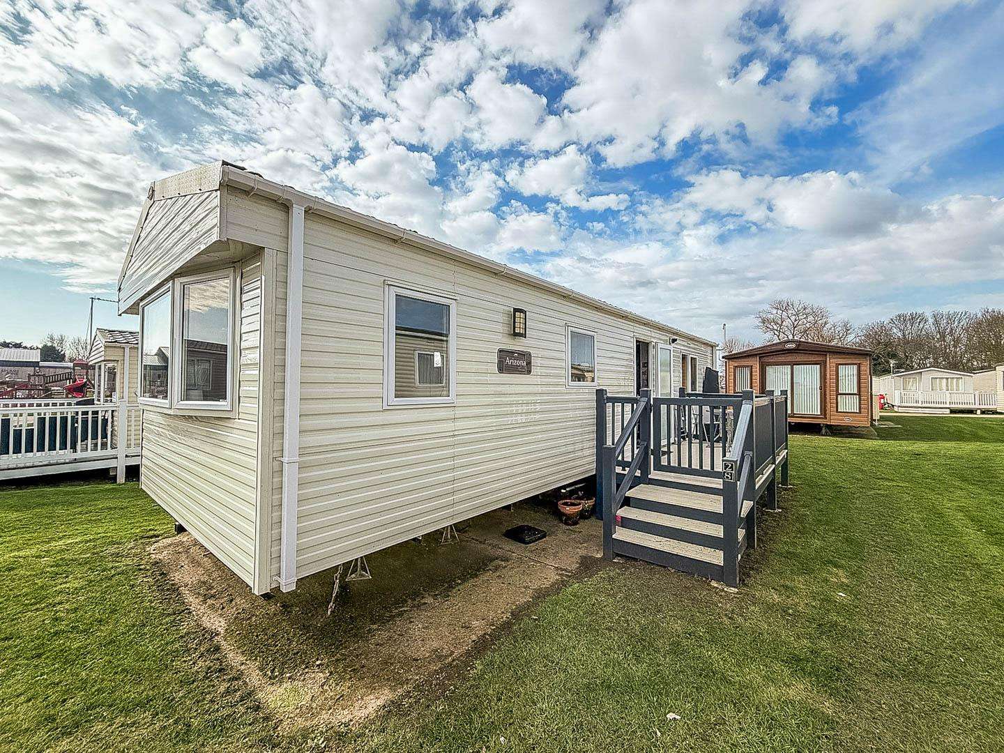 Experience the perfect family holidays 2026 at Park Holidays Broadland Sands, where you can enjoy a caravan holiday with comfortable amenities, including a caravan with decking for relaxing evenings. - property