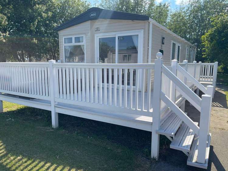 23049S⭐ – Sandringham area, 2 bed, 6 berth caravan with wrap-around decking. Opal rated. Preview 0