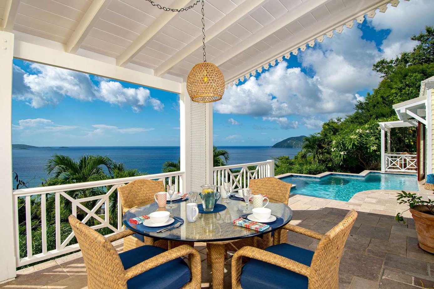 Ocean-view patio with pool and alfresco dining area