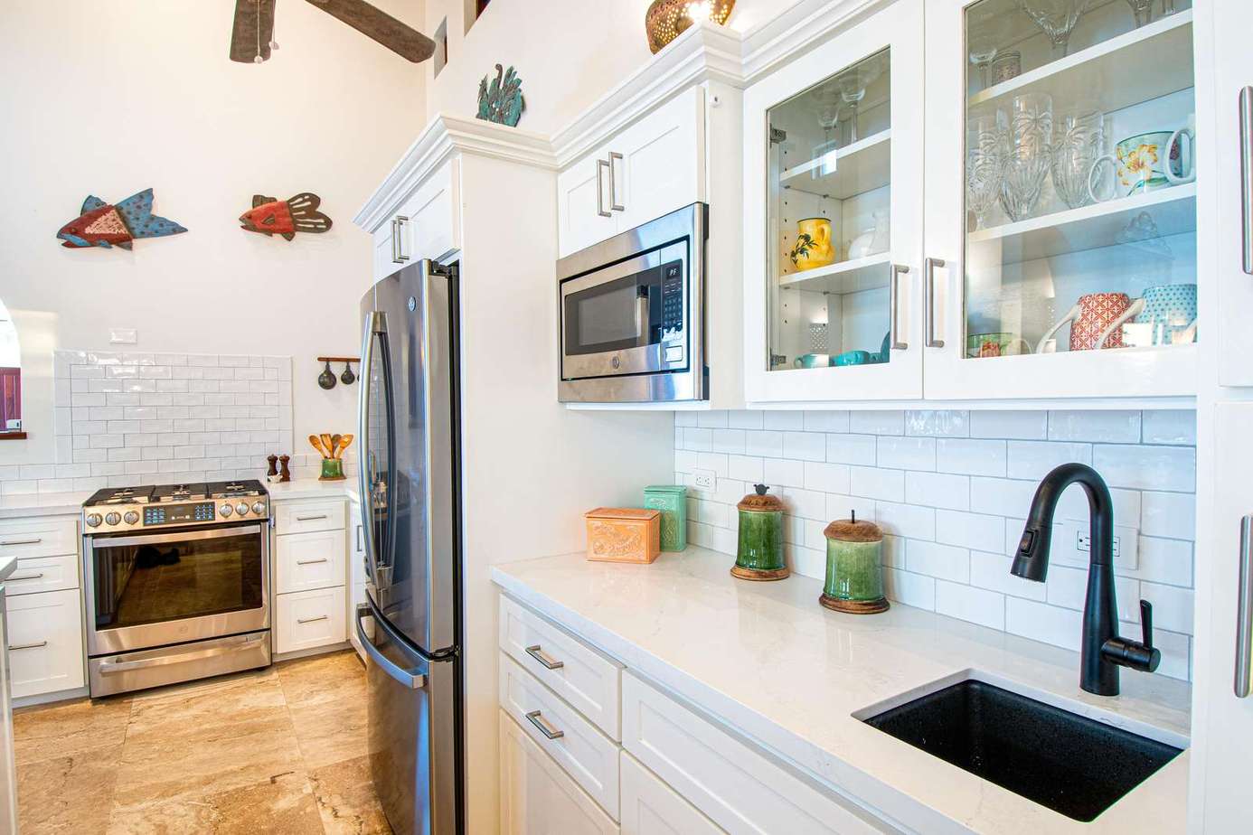 Bright, airy kitchen with modern appliances and charming decor