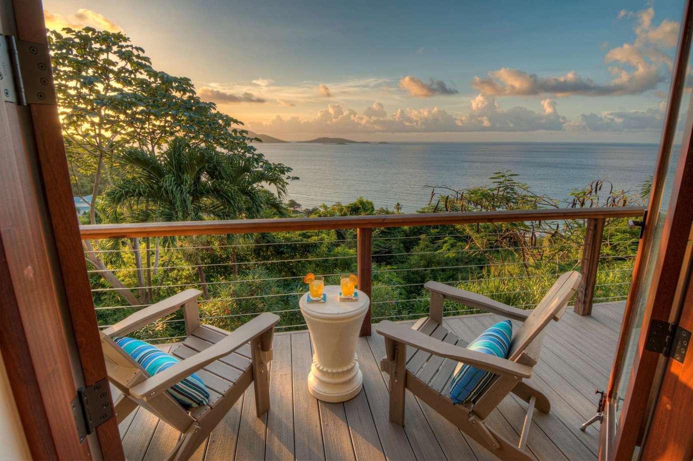 Sunset views from a cozy balcony retreat