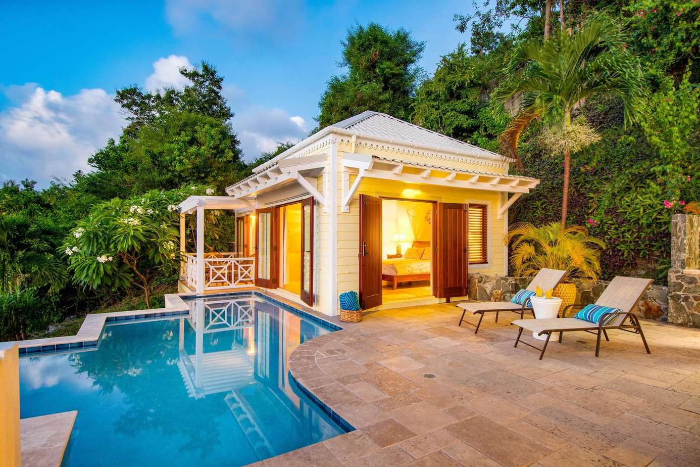 Secluded poolside retreat with lush tropical views