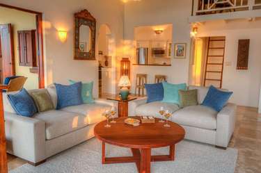 Cozy living room with warm lighting and inviting seating