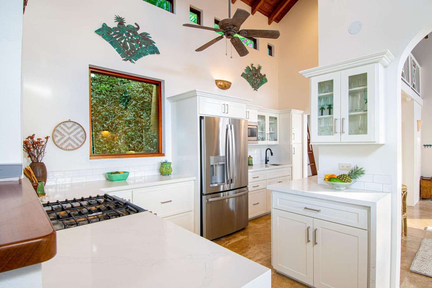 Bright, airy kitchen with vaulted ceilings and modern appliances