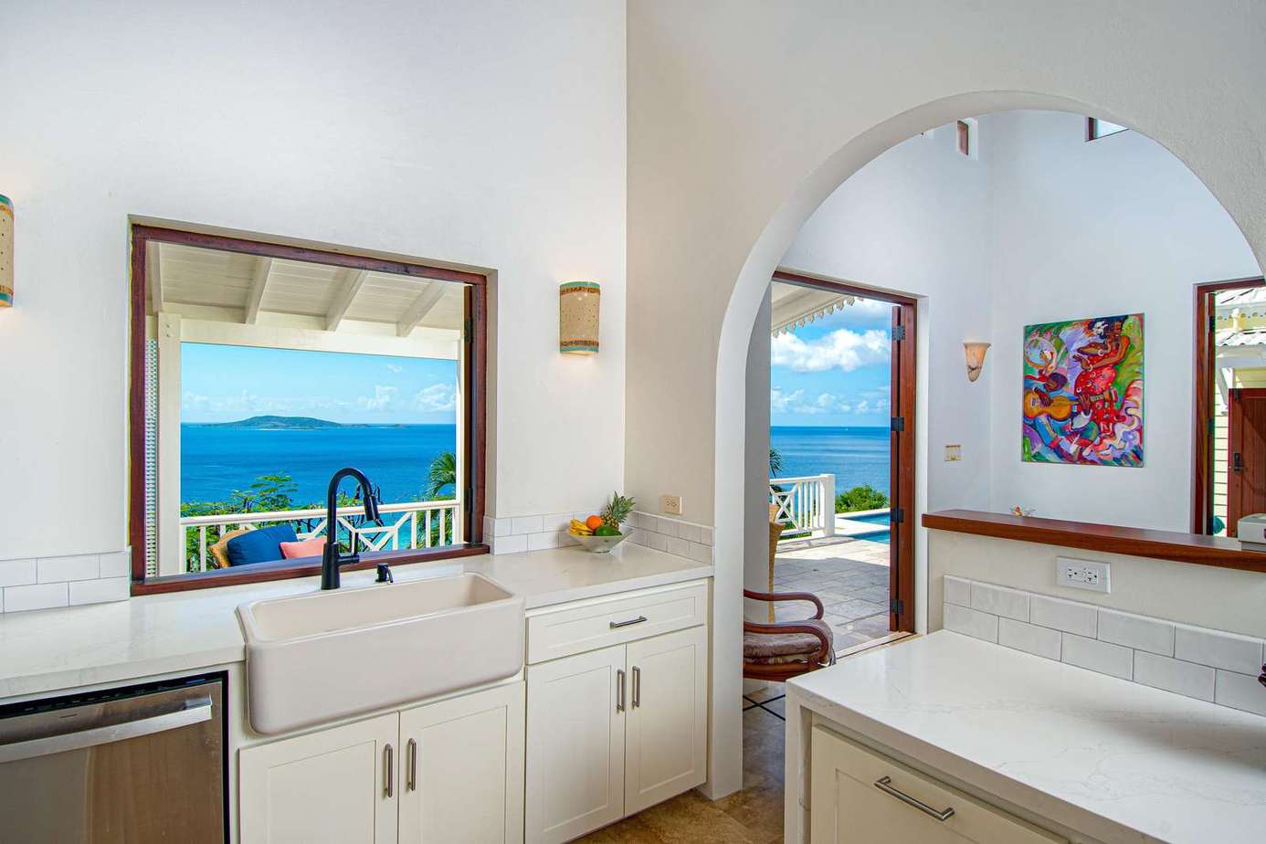 Bright kitchen with stunning ocean views and open layout