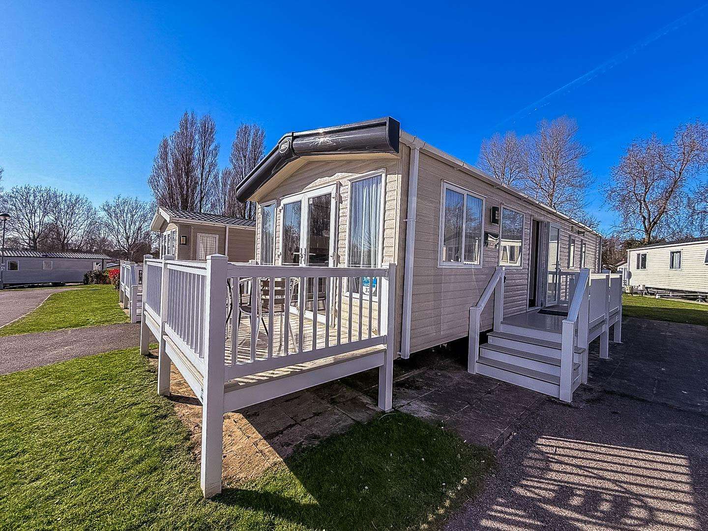 Discover the beauty of the Norfolk coastline with a short stay at Hopton Holiday Village, enjoying the comfort of a static caravan with decking for your perfect family getaway. - property