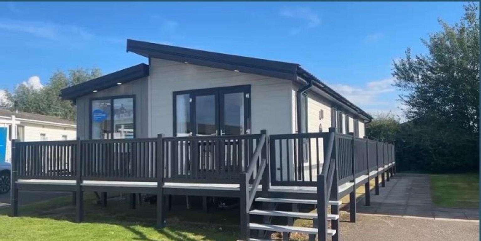 Experience the ultimate comfort and relaxation with this 6 berth lodge at Manor Park Holiday Park in Hunstanton, Norfolk. - property