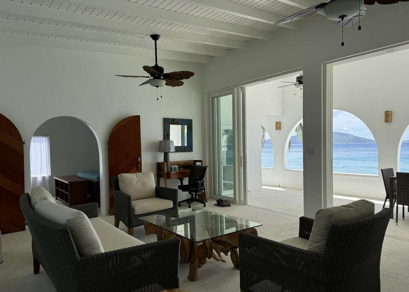 Spacious living room with stunning ocean views and natural light