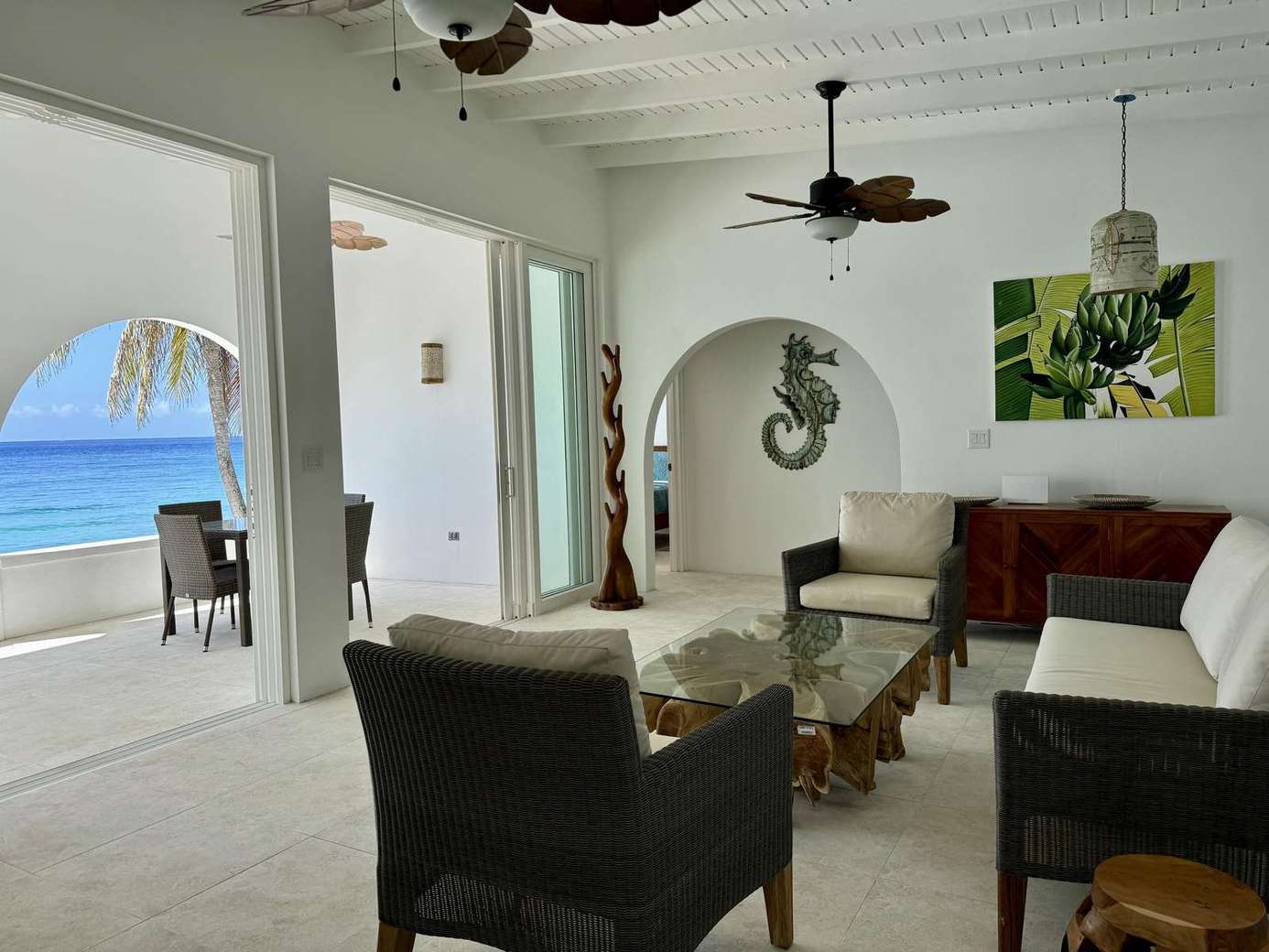 Airy living room with ocean views and coastal charm