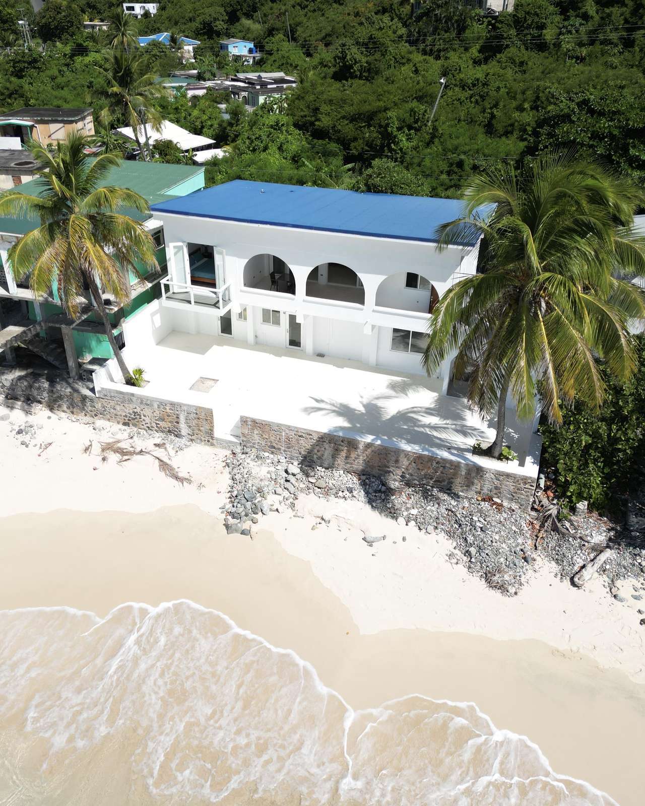 Oceanfront villa with stunning beach and palm views