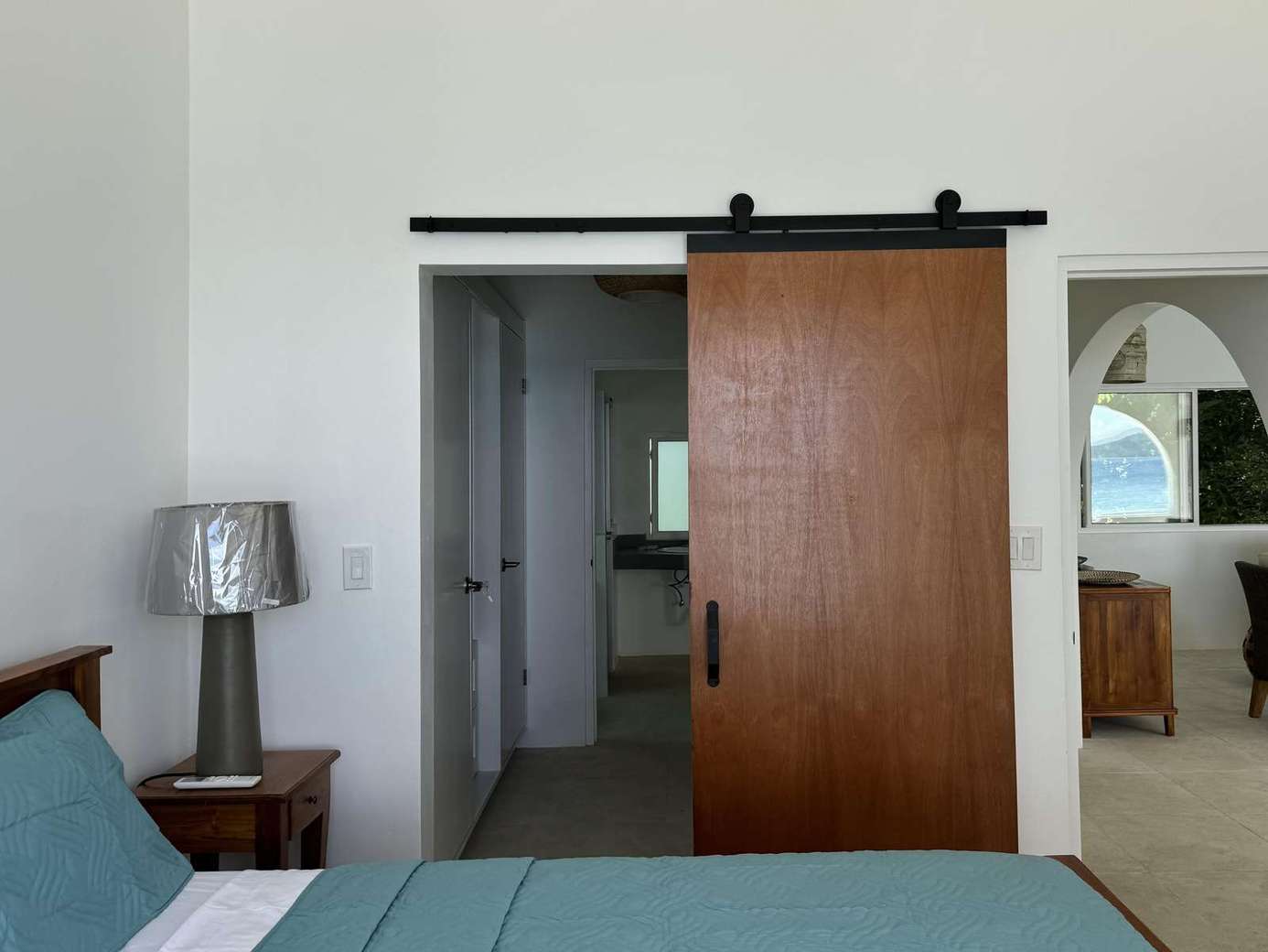 Cozy bedroom retreat with stylish sliding barn door