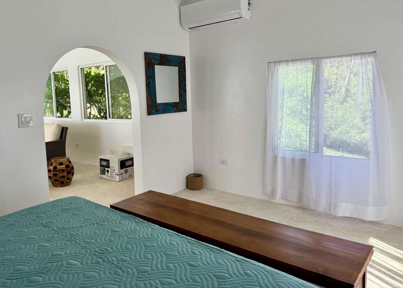 Bright and airy bedroom with serene garden views