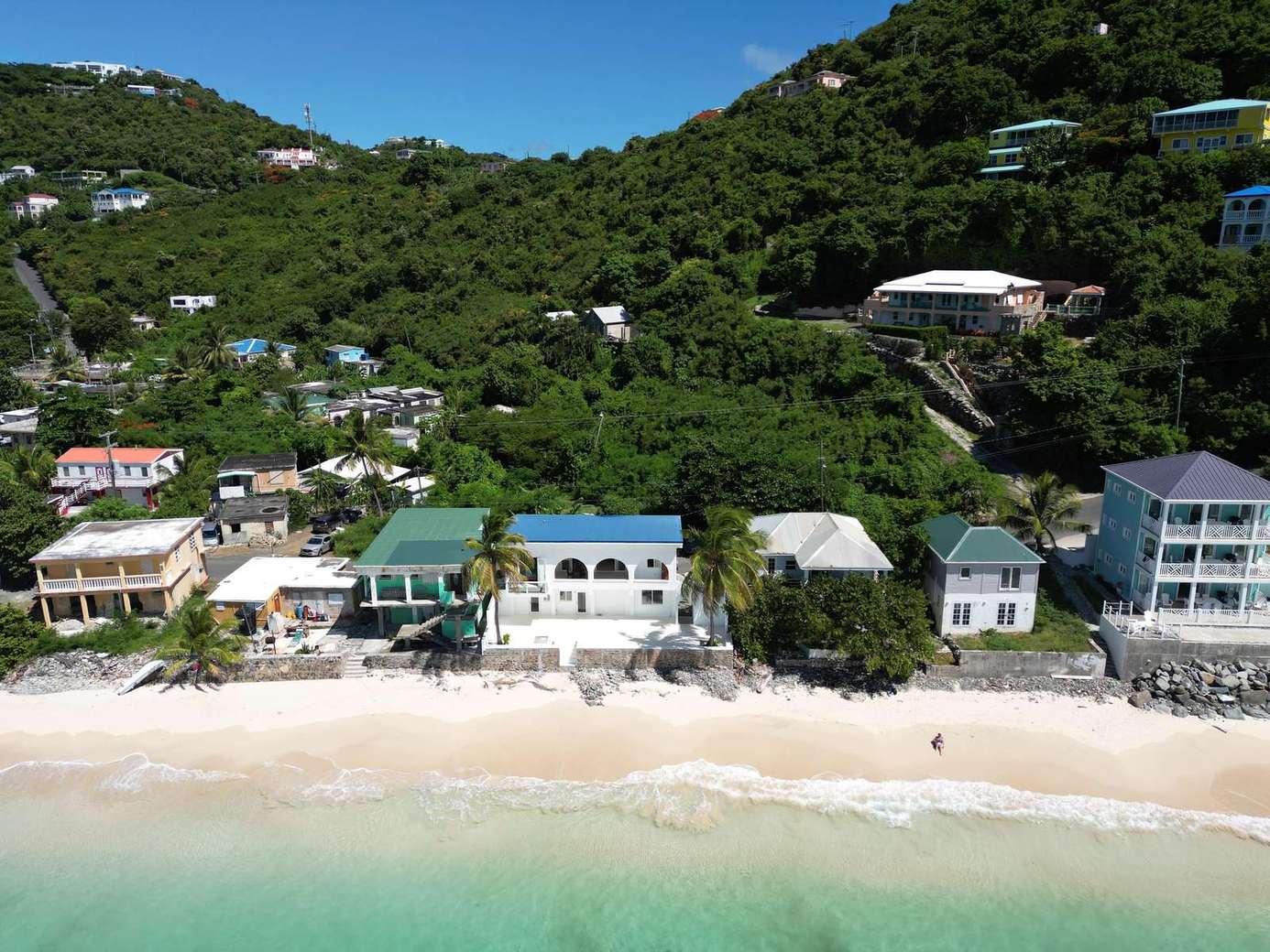 Charming beachfront homes with stunning ocean views and sandy shores