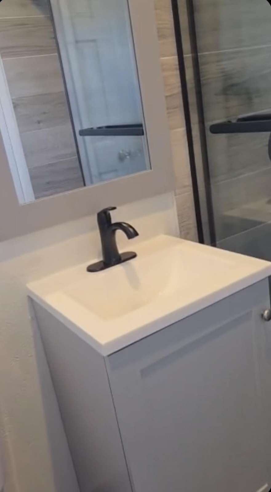 Sleek bathroom vanity with modern fixtures and clean design