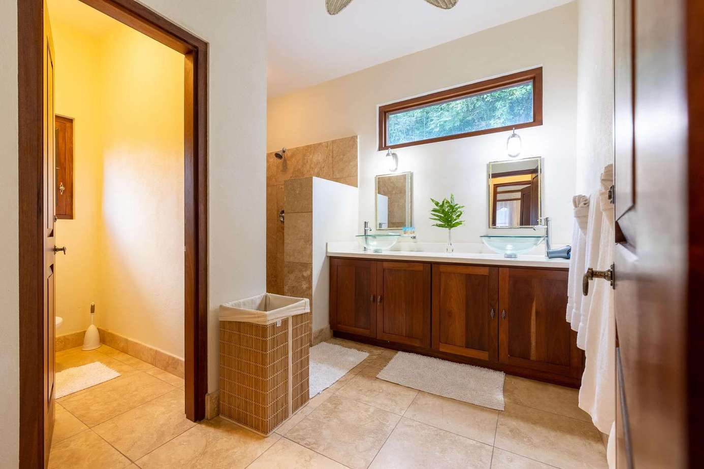 Spacious bathroom retreat with modern fixtures and natural light
