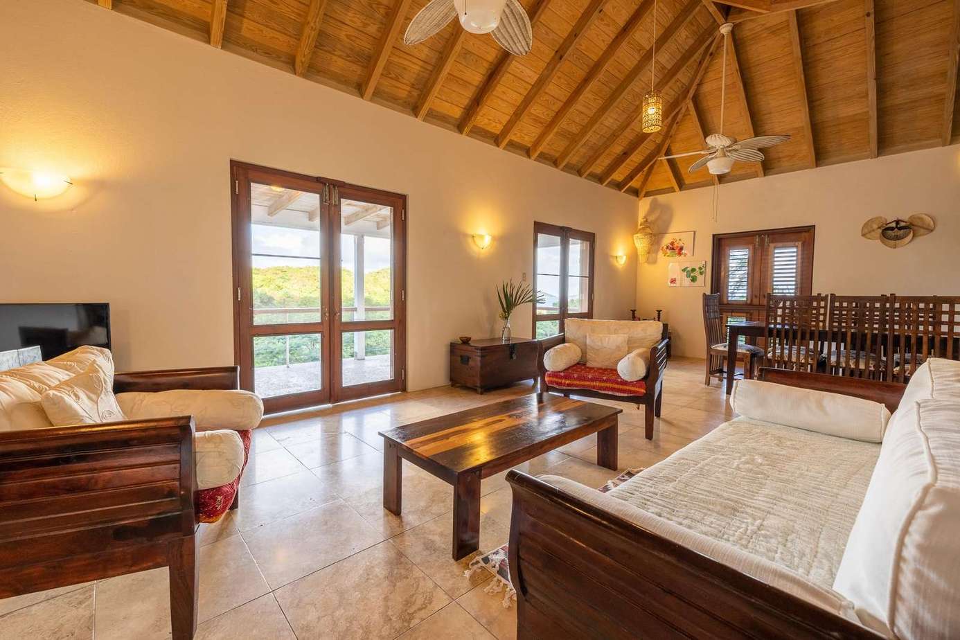 Spacious living room with vaulted ceilings and natural light