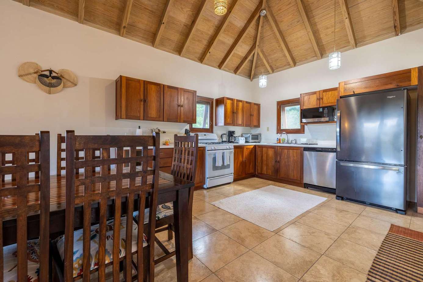 Spacious kitchen with vaulted ceilings and rustic charm