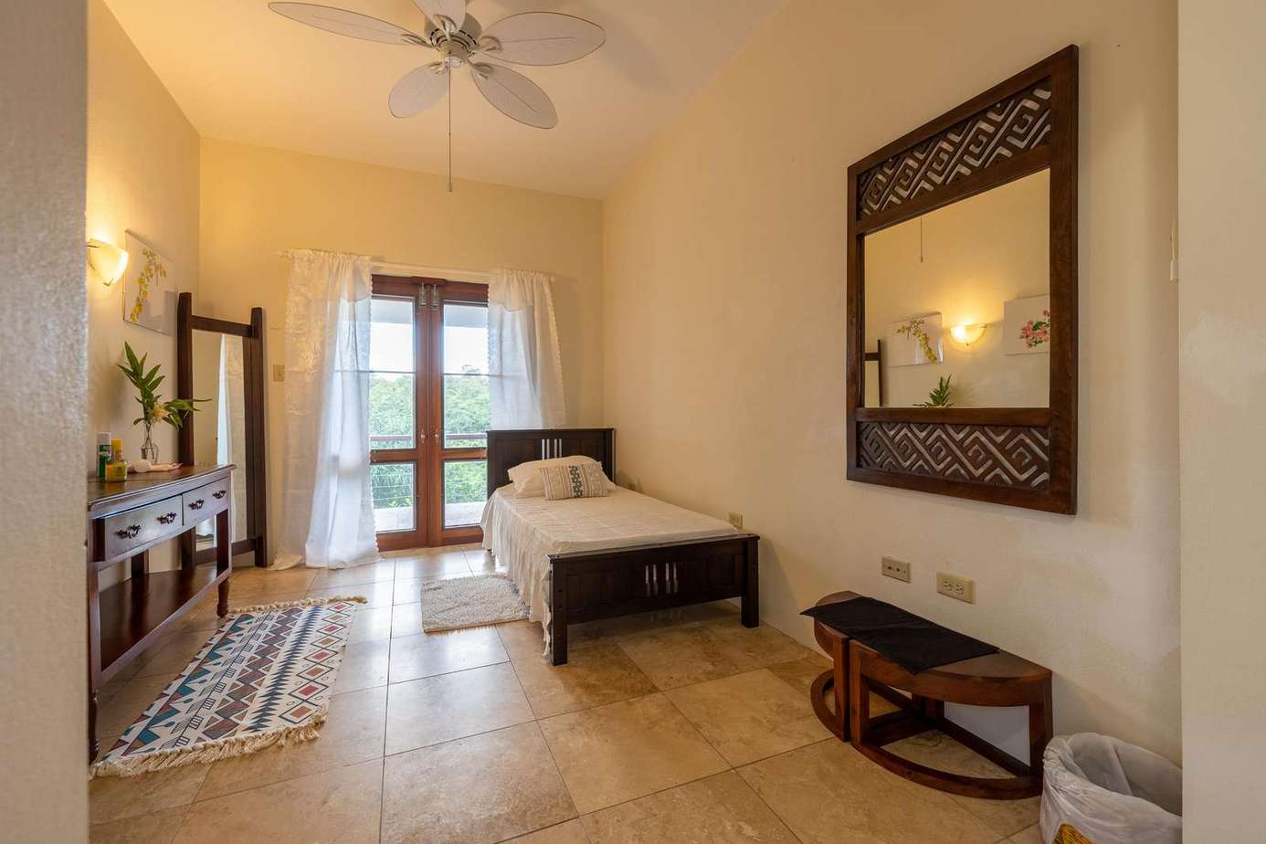 Bright and airy bedroom with private balcony access