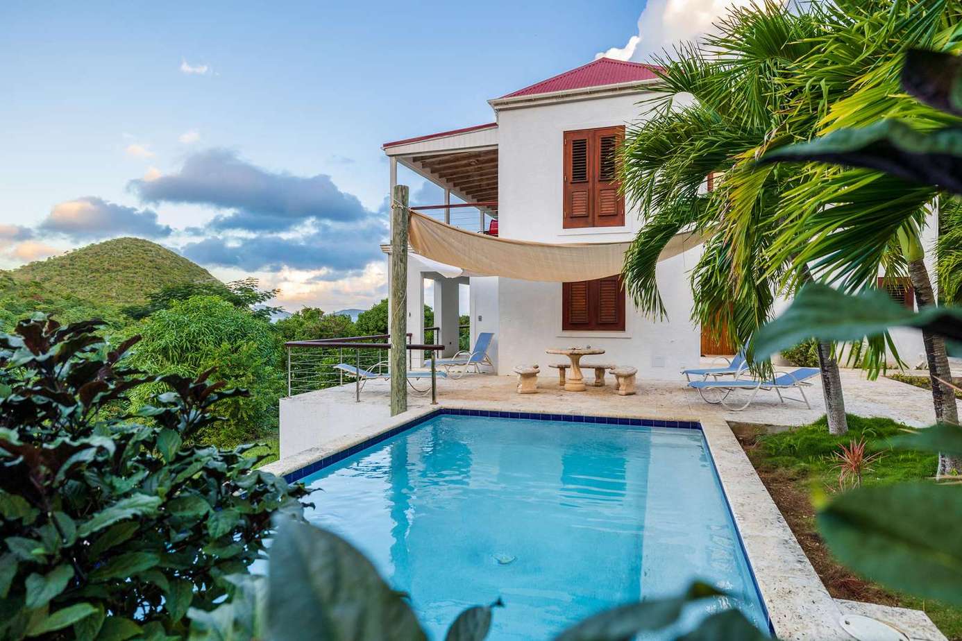 Private pool oasis surrounded by lush tropical greenery