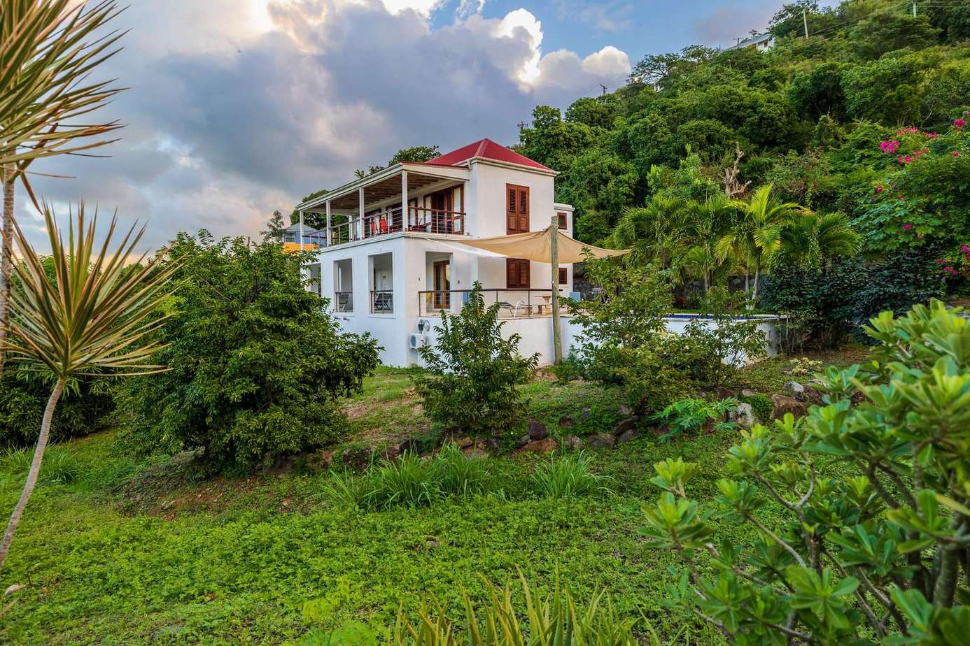 Secluded hillside retreat surrounded by lush greenery and tranquility