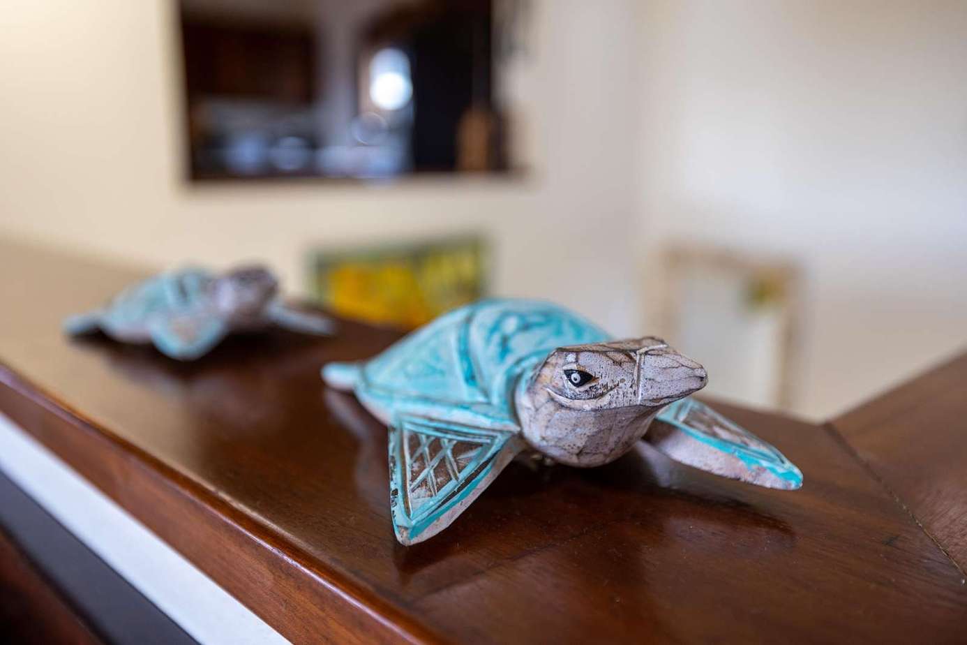 Charming handcrafted turtle decor adds coastal charm to your stay
