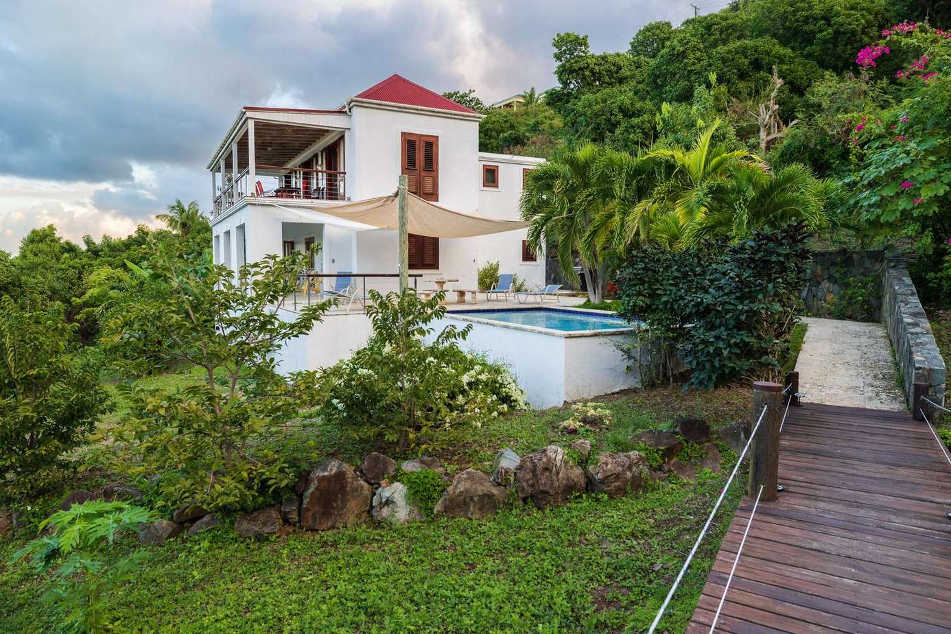 Secluded villa with lush gardens and private pool retreat