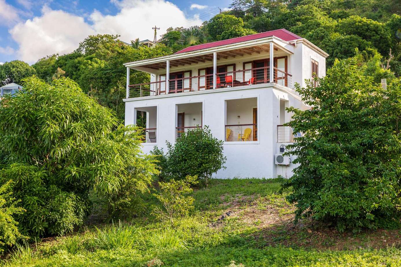 Spacious hillside retreat with panoramic balcony views