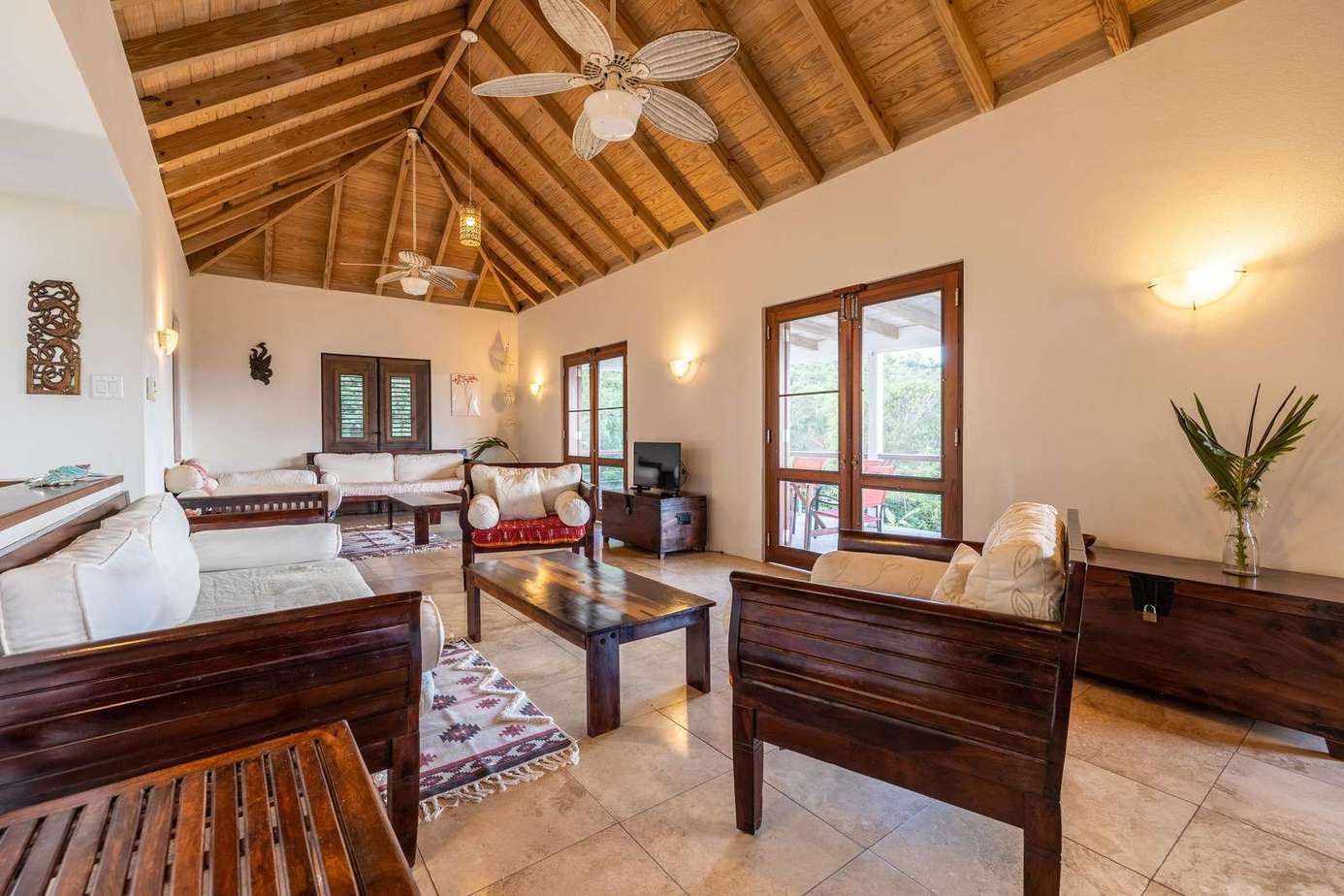 Spacious living room with vaulted ceilings and natural light