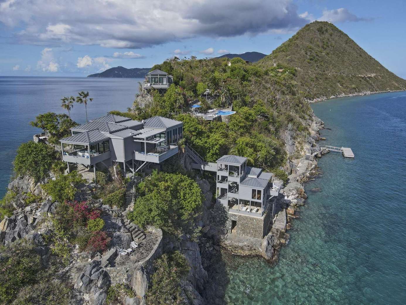 Secluded cliffside retreat with panoramic ocean views