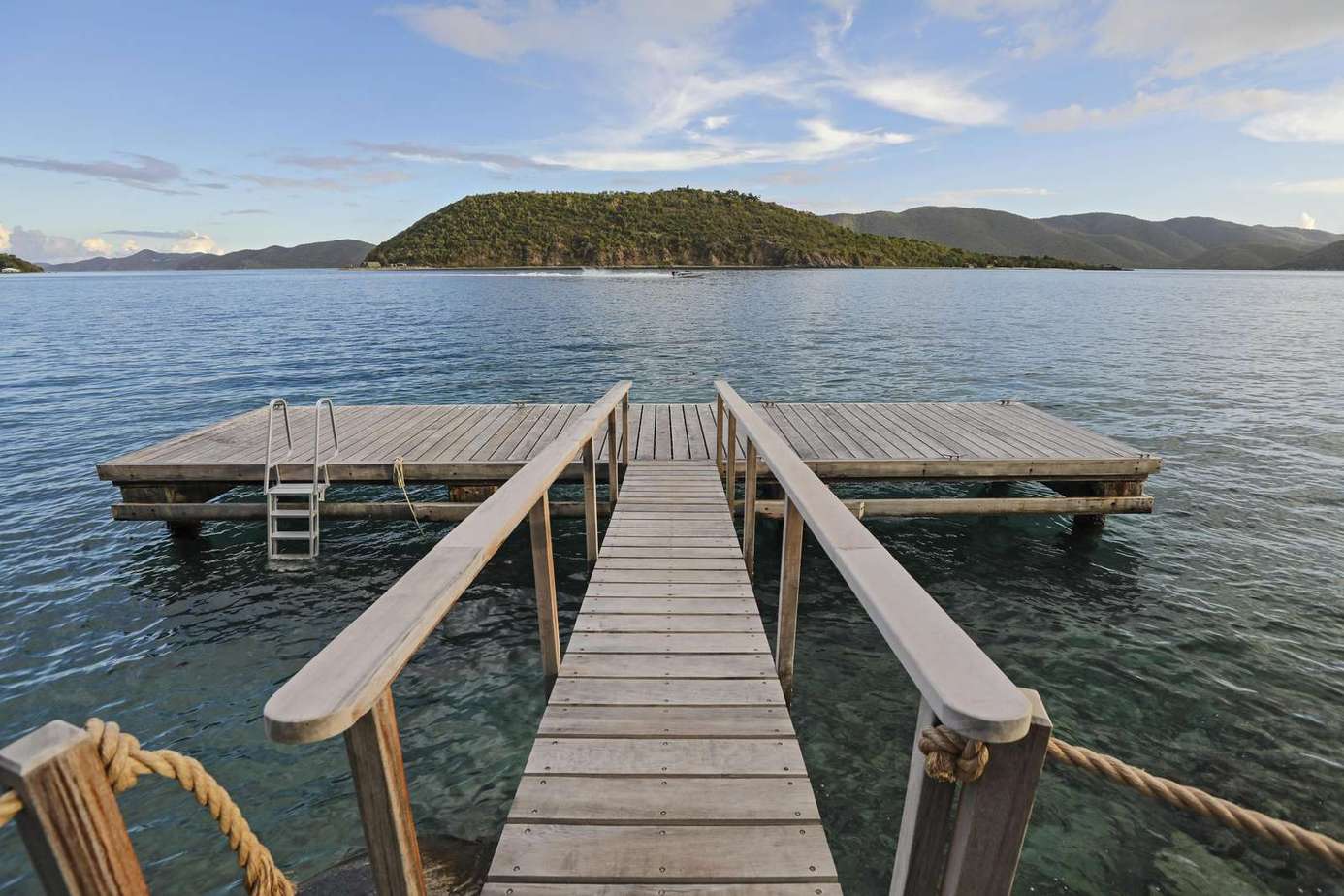 Peaceful dock retreat with stunning lake and mountain views