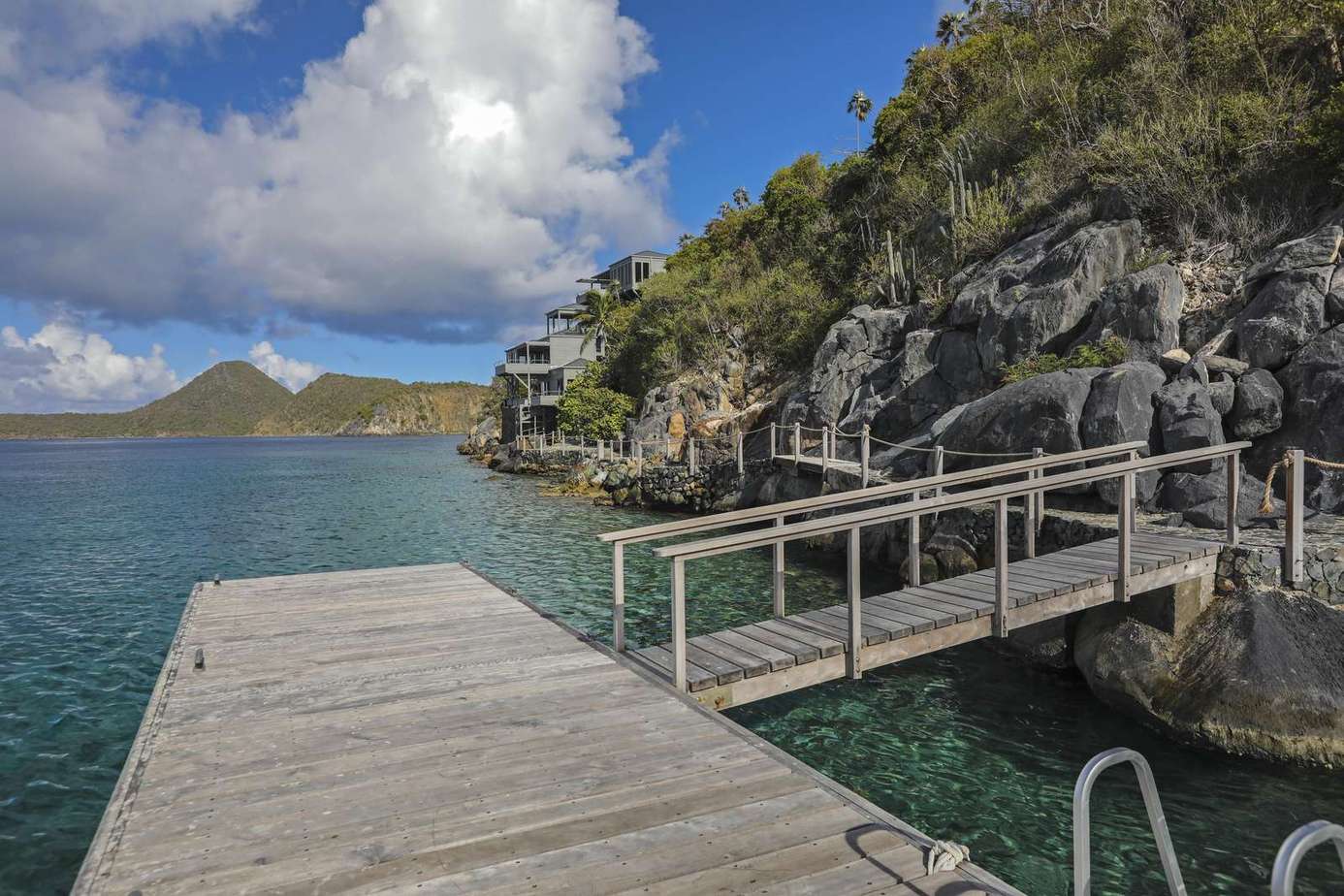 Secluded dock with stunning water and mountain views