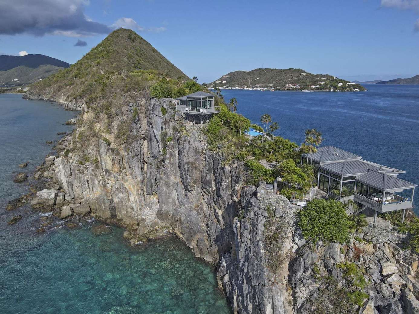 Secluded cliffside retreat with panoramic ocean views